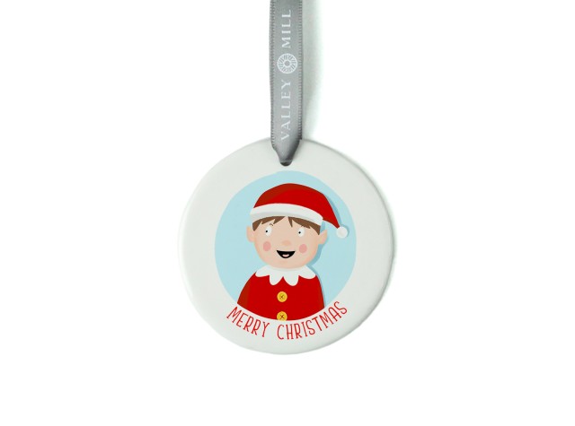 White ceramic christmas tree decoration with the image of a boy elf